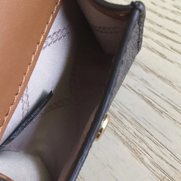 Michael Kors Brown Acorn Studded AirPod Clipcase - Picture 7 of 11